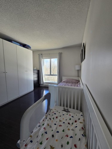 Chambre à coucher - 401-3330 Boul. Le Carrefour, Laval (Chomedey), QC - Indoor Photo Showing Bedroom