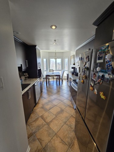 Cuisine - 401-3330 Boul. Le Carrefour, Laval (Chomedey), QC - Indoor Photo Showing Other Room