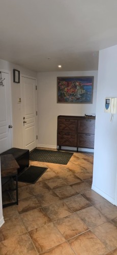 Hall d'entrée/Vestibule - 401-3330 Boul. Le Carrefour, Laval (Chomedey), QC - Indoor Photo Showing Other Room