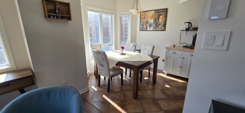 Salle à manger - 401-3330 Boul. Le Carrefour, Laval (Chomedey), QC - Indoor Photo Showing Dining Room