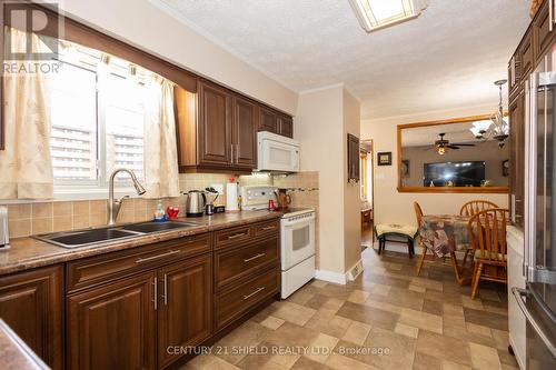 1443 1St Street E, Cornwall, ON - Indoor Photo Showing Kitchen With Double Sink