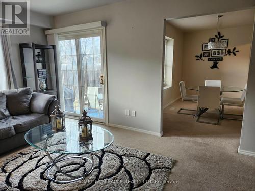 Backyard Door from Living Area - 6149 Starfield Crescent, Mississauga, ON - Indoor Photo Showing Living Room
