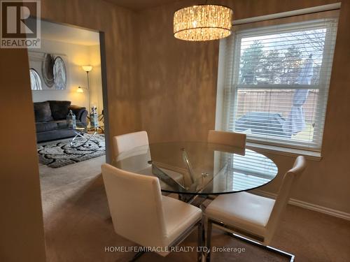 Dining Area with Window to backyard - 6149 Starfield Crescent, Mississauga, ON - Indoor Photo Showing Dining Room