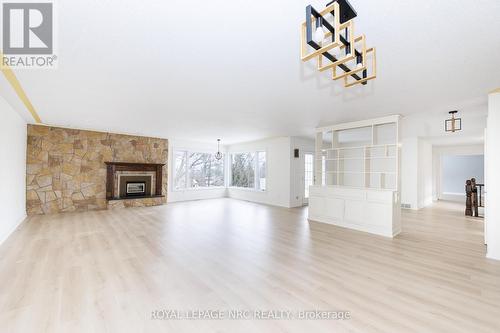 61 Tremont Drive, St. Catharines (Glendale/Glenridge), ON - Indoor Photo Showing Living Room With Fireplace