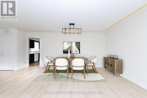 Virtually staged dining area - 61 Tremont Drive, St. Catharines (Glendale/Glenridge), ON - Indoor Photo Showing Dining Room