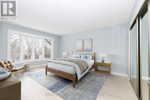 Virtually staged primary bedroom - 61 Tremont Drive, St. Catharines (Glendale/Glenridge), ON - Indoor Photo Showing Bedroom