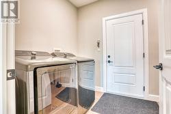 laundry room and door going out to garage - 