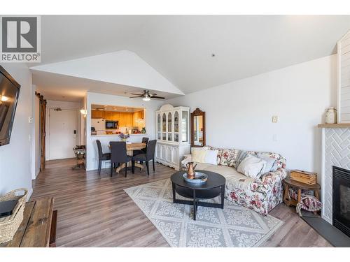 3320 Centennial Drive Unit# 403, Vernon, BC - Indoor Photo Showing Living Room With Fireplace