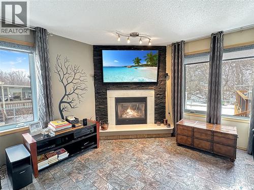 20 Willow Crescent, Fort Qu'Appelle, SK - Indoor Photo Showing Living Room With Fireplace