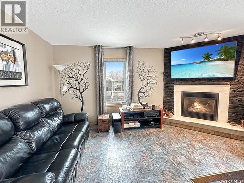 20 Willow Crescent, Fort Qu'Appelle, SK - Indoor Photo Showing Living Room With Fireplace