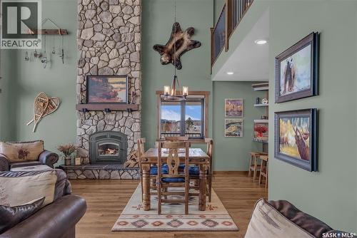 35 Grace Bay, Diefenbaker Lake, SK - Indoor Photo Showing Living Room With Fireplace