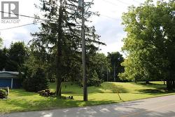 Surrounding community featuring view of wooded area - 
