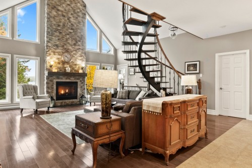 Salle familiale - 4 Ch. Du Colibri, Val-Des-Lacs, QC - Indoor Photo Showing Living Room With Fireplace