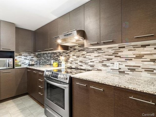 Cuisine - 412-10150 Place De L'Acadie, Montréal (Ahuntsic-Cartierville), QC - Indoor Photo Showing Kitchen With Upgraded Kitchen