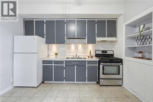 79 Murray Street E, Hamilton, ON - Indoor Photo Showing Kitchen With Double Sink