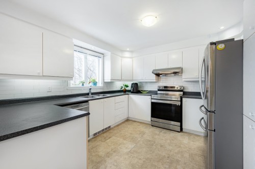 Kitchen - 95 Rue Perron, La Prairie, QC - Indoor Photo Showing Kitchen With Double Sink