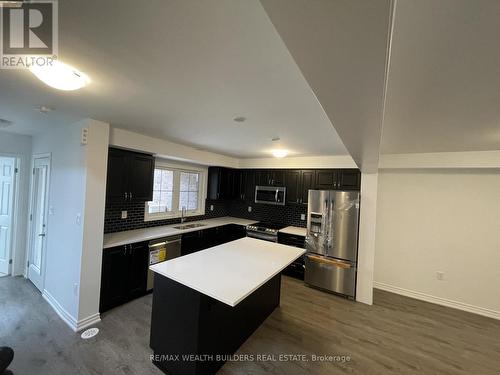 1260 Wintergreen Place, Milton, ON - Indoor Photo Showing Kitchen With Stainless Steel Kitchen