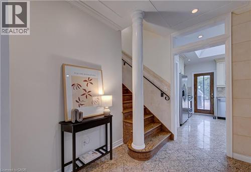 Stairway with granite tiled floors, recessed lighting, and crown molding - 655 Ellengale Road, Burlington, ON - Indoor Photo Showing Other Room
