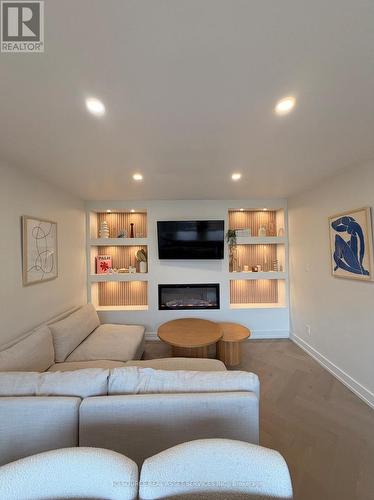 10 - 914 Mohawk Road E, Hamilton, ON - Indoor Photo Showing Living Room With Fireplace