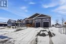 Two-car garage with extra parking. - 100 Pendleton Street, Champlain, ON  - Outdoor 