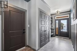 Large close at entrance / door to garage. - 