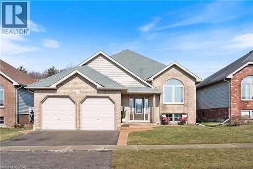 63 Redbud Crescent, Simcoe, ON - Outdoor With Facade