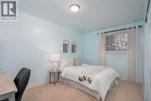 Bedroom with light colored carpet and a desk - 1278 Consort Crescent, Burlington, ON - Indoor Photo Showing Bedroom