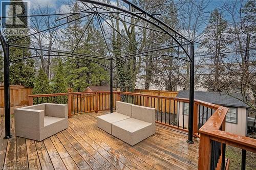 Wooden deck with outdoor furniture and a storage unit - 1278 Consort Crescent, Burlington, ON - Outdoor With Deck Patio Veranda With Exterior