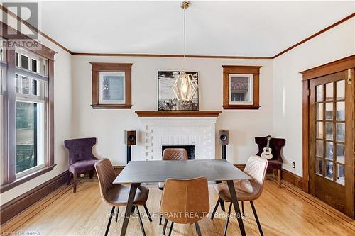 134 Sherman Avenue S, Hamilton, ON - Indoor Photo Showing Dining Room With Fireplace
