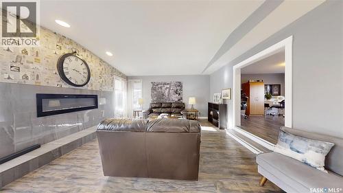24 Hahn Crescent, Kindersley, SK - Indoor Photo Showing Living Room With Fireplace