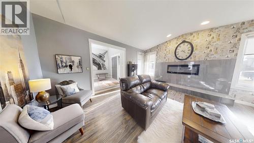 24 Hahn Crescent, Kindersley, SK - Indoor Photo Showing Living Room With Fireplace