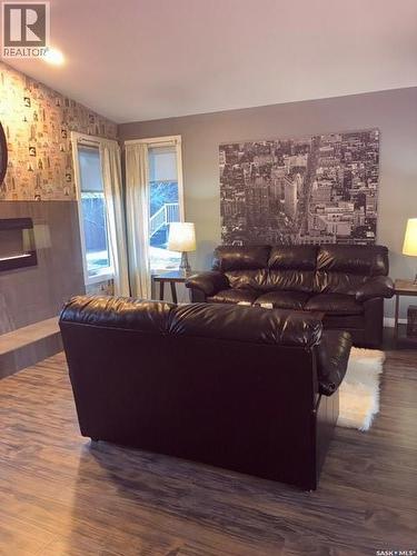 24 Hahn Crescent, Kindersley, SK - Indoor Photo Showing Living Room With Fireplace
