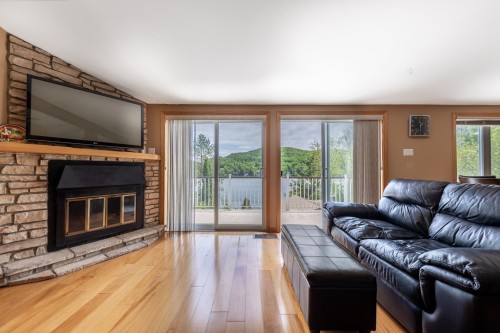 Salon - 38 350E Avenue, Saint-Hippolyte, QC - Indoor Photo Showing Living Room With Fireplace