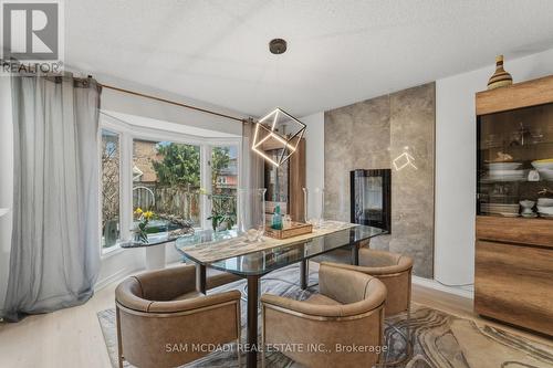 6074 Leeside Crescent, Mississauga, ON - Indoor Photo Showing Dining Room With Fireplace