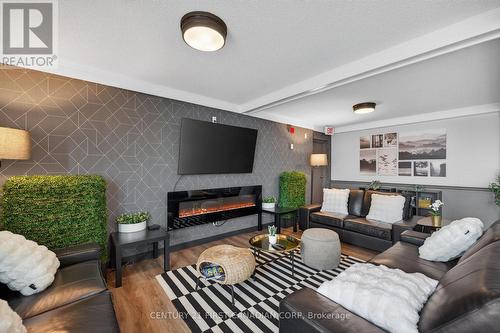 405 - 440 Central Avenue, London East (East F), ON - Indoor Photo Showing Living Room With Fireplace