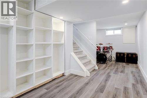 Basement with light wood-style floors and recessed lighting - 624 Burgess Avenue, Hamilton, ON - Indoor