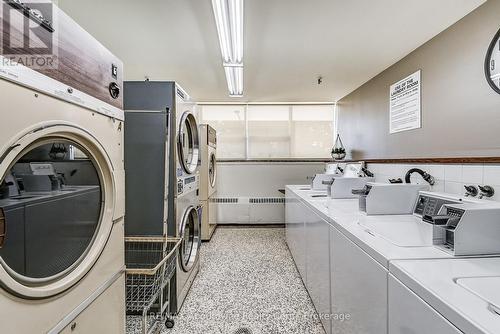 Coin Operated Laundry Room - 401 - 212 Kerr Street, Oakville (Co Central), ON - Indoor Photo Showing Laundry Room