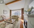 Wood beams and a soaring ceiling - 54 Glenwood Drive, Kitchener, ON  - Indoor Photo Showing Living Room With Fireplace 