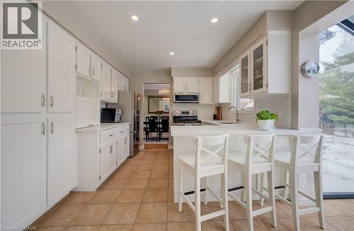 Adjacent to the kitchen there is a large dinette area as well as this sunroom nook. - 54 Glenwood Drive, Kitchener, ON - Indoor Photo Showing Dining Room