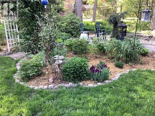 The fully enclosed gazebo is a great place to enjoy dinner. Table and chairs are included! - 54 Glenwood Drive, Kitchener, ON - Outdoor