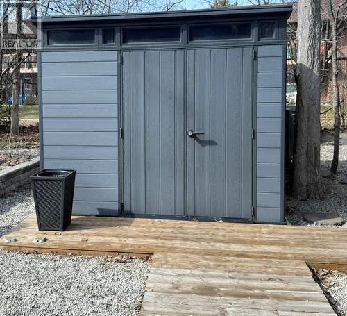Enjoy dinner in the gazebo under the fan and string lights. - 54 Glenwood Drive, Kitchener, ON - Indoor Photo Showing Dining Room
