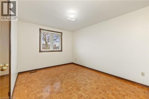 Unfurnished room with parquet floors and baseboards - 57 Derek Drive, Hamilton, ON - Indoor Photo Showing Other Room