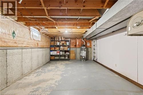 Unfinished basement with gas water heater - 57 Derek Drive, Hamilton, ON - Indoor Photo Showing Basement