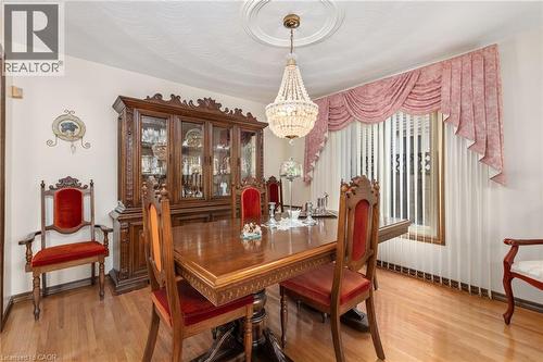 Dining room featuring suspended lighting and light wood-type flooring - 57 Derek Drive, Hamilton, ON - Indoor Photo Showing Dining Room