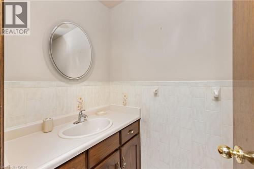 Bathroom with vanity and tile walls - 57 Derek Drive, Hamilton, ON - Indoor Photo Showing Bathroom