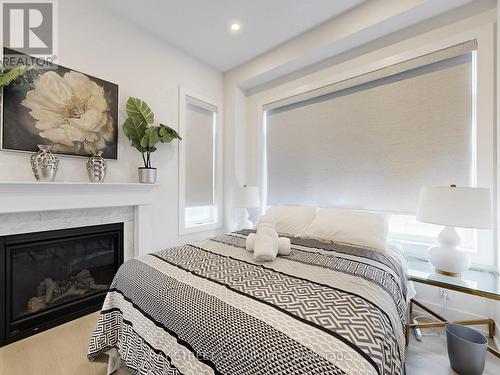 88 Harvey Bunker Crescent, Markham, ON - Indoor Photo Showing Bedroom With Fireplace
