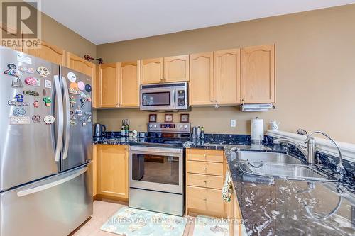 5829 Yachtsman Crossing, Mississauga, ON - Indoor Photo Showing Kitchen With Double Sink