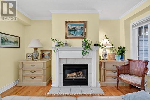 42 College Circle, Ottawa, ON - Indoor Photo Showing Living Room With Fireplace