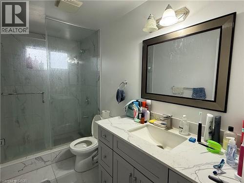 Full bath featuring vanity, a marble finish shower, and light marble finish flooring - 60 Helene Crescent, Waterloo, ON - Indoor Photo Showing Bathroom