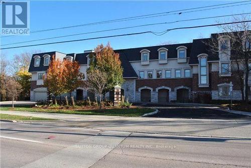 305 - 390 Upper Middle Road E, Oakville, ON - Outdoor With Facade
